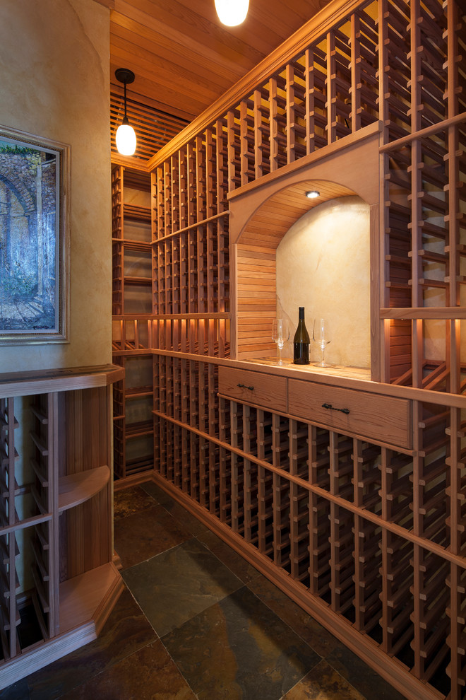 Example of a tuscan wine cellar design in Miami