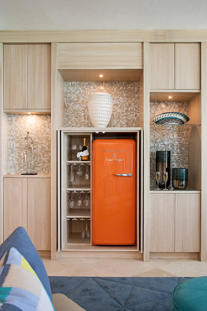 Photo of a contemporary single-wall wet bar in Other with a submerged sink, flat-panel cabinets, light wood cabinets, wood worktops, multi-coloured splashback, mosaic tiled splashback, beige floors and beige worktops.