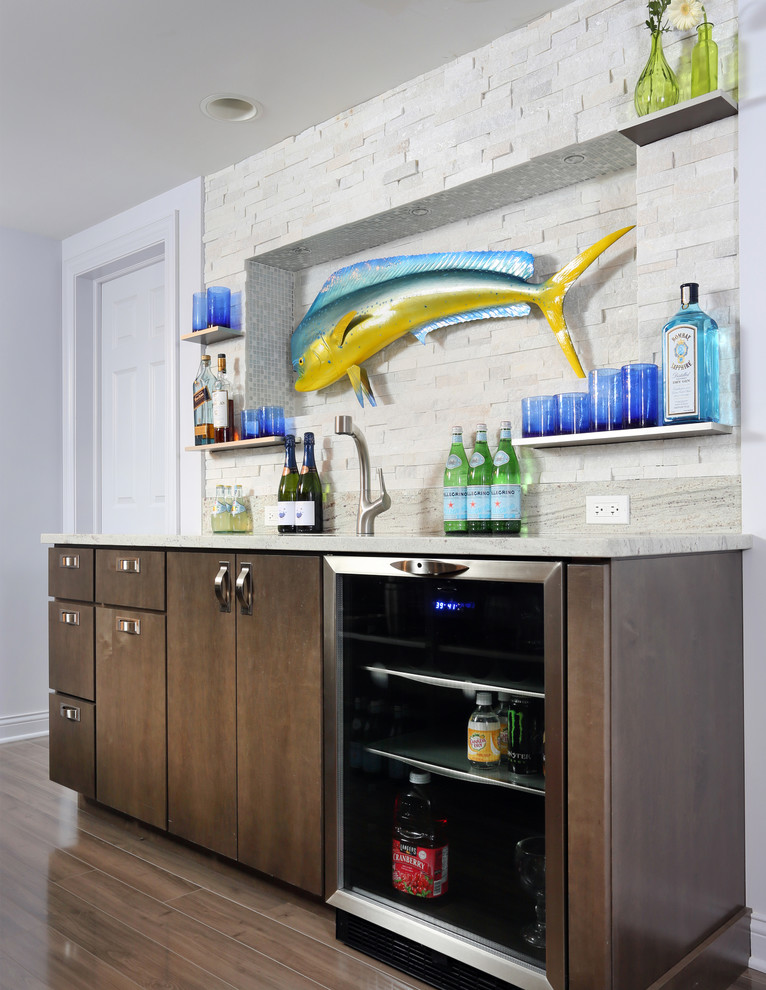 Photo of a medium sized classic single-wall wet bar in Chicago with flat-panel cabinets, dark wood cabinets, granite worktops, grey splashback, stone tiled splashback and a submerged sink.