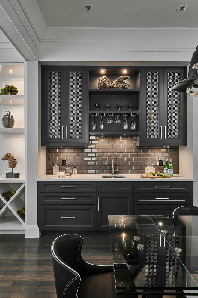 Design ideas for a small classic single-wall wet bar in Vancouver with a submerged sink, shaker cabinets, blue cabinets, quartz worktops, grey splashback, ceramic splashback, dark hardwood flooring, brown floors and white worktops.