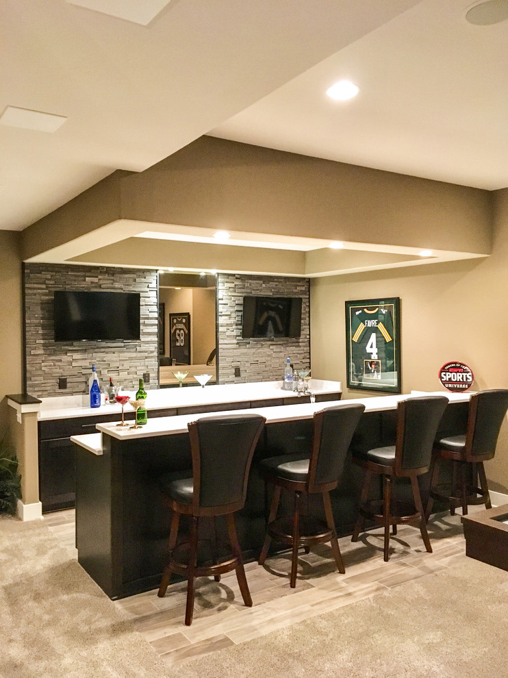 This is an example of a medium sized modern galley breakfast bar in Milwaukee with a submerged sink, shaker cabinets, dark wood cabinets, engineered stone countertops, grey splashback, stone tiled splashback, ceramic flooring, grey floors and white worktops.