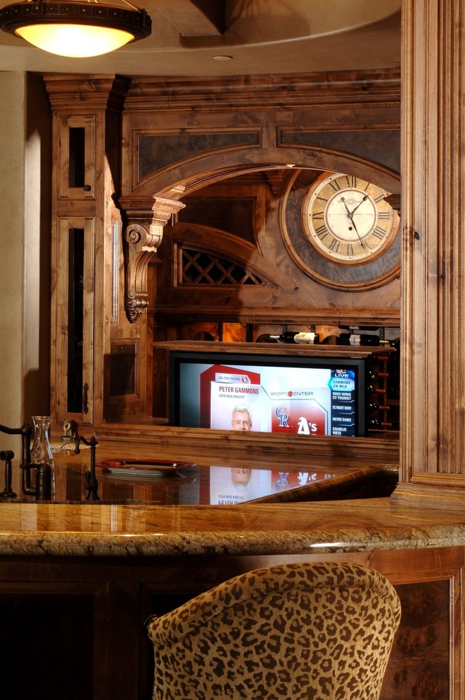 Example of a tuscan home bar design in Other