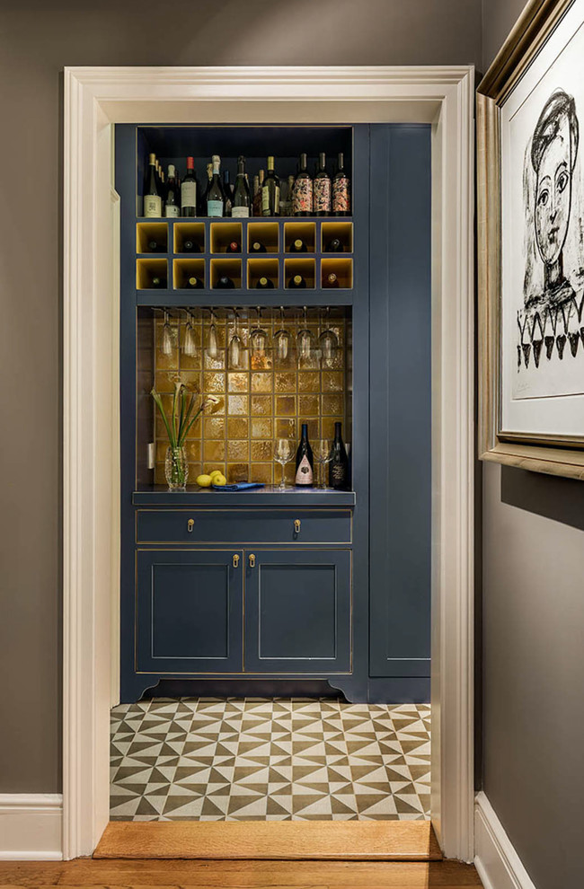 Inspiration for a small traditional single-wall wet bar in New York with shaker cabinets, blue cabinets, a submerged sink, wood worktops, yellow splashback, ceramic splashback, concrete flooring, grey floors and blue worktops.