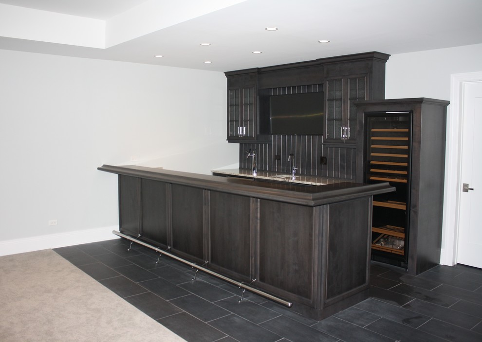 Inspiration for a large transitional home bar remodel in Chicago