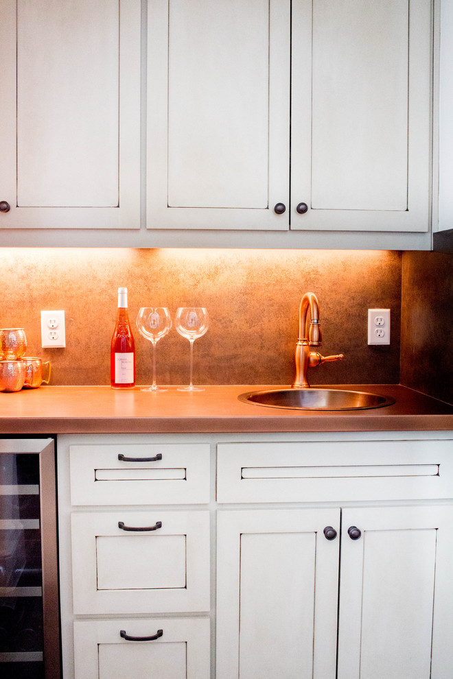 Photo of a classic home bar in Austin with white cabinets, copper worktops and multi-coloured splashback.
