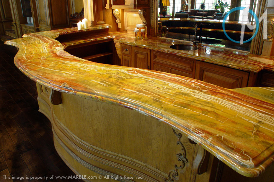Photo of a large contemporary breakfast bar in New York with onyx worktops.