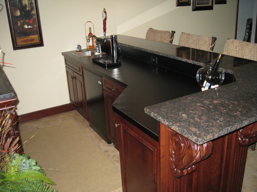 Photo of a medium sized traditional home bar in Other.