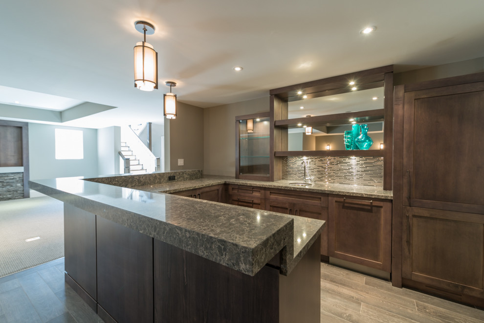 Design ideas for an expansive traditional home bar in Toronto with porcelain flooring.