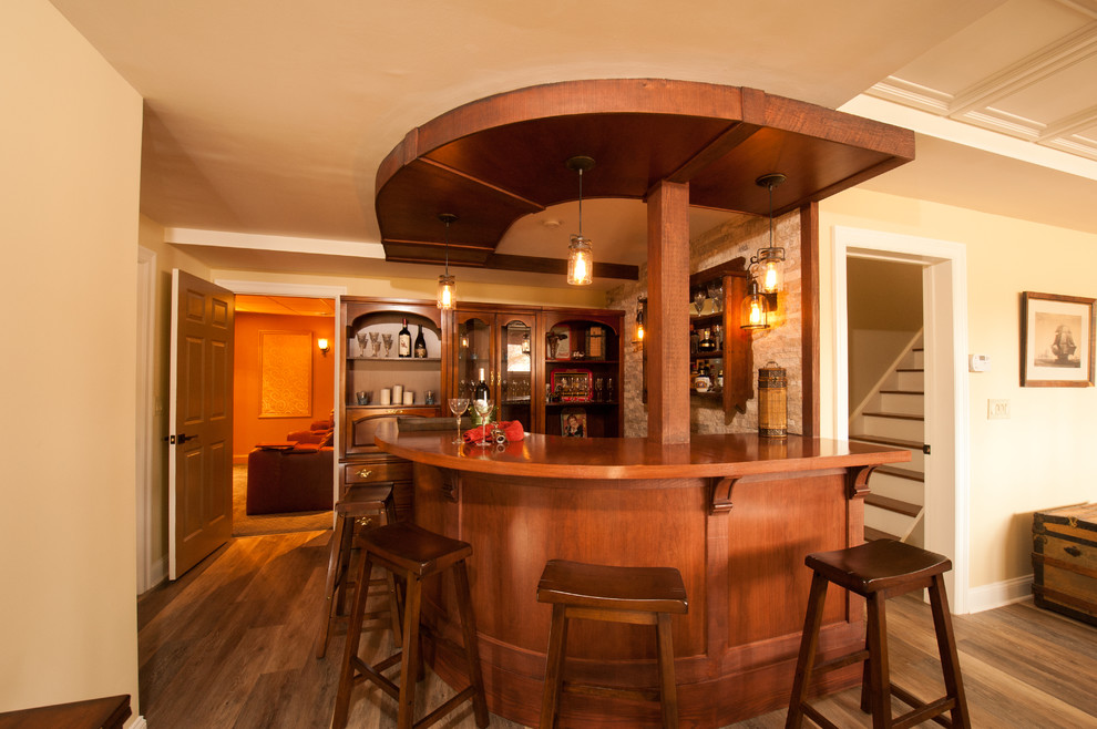 Example of a large trendy galley medium tone wood floor seated home bar design in Boston with open cabinets, dark wood cabinets, wood countertops, beige backsplash and stone tile backsplash