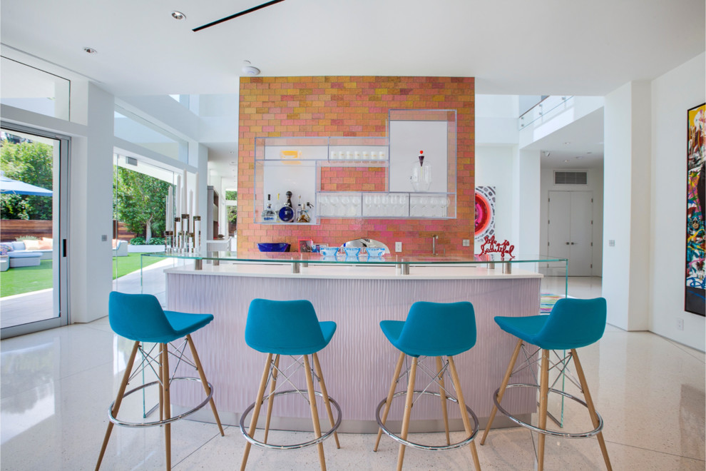 Design ideas for a large contemporary breakfast bar in Los Angeles with open cabinets, glass worktops and multi-coloured splashback.