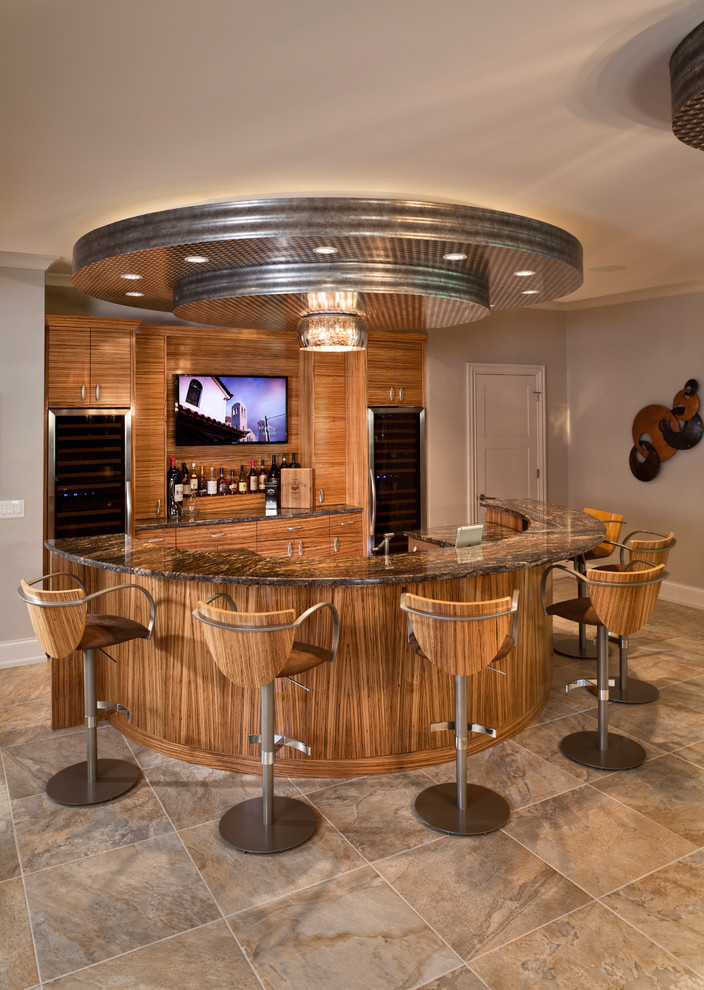 Inspiration for a large contemporary u-shaped seated home bar remodel in Cincinnati with flat-panel cabinets and medium tone wood cabinets