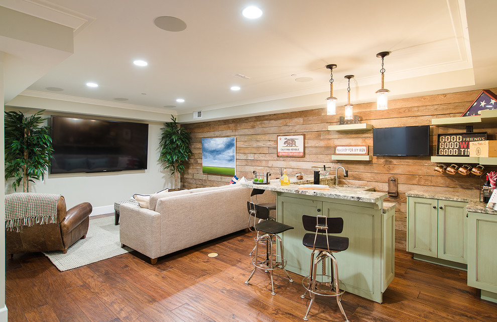 Example of a beach style l-shaped medium tone wood floor seated home bar design in Los Angeles with green cabinets