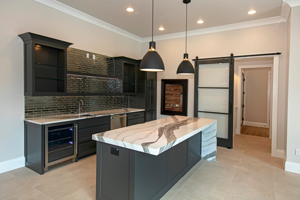 Photo of a large classic galley wet bar in Dallas with shaker cabinets, black cabinets, engineered stone countertops, grey splashback, ceramic flooring and white worktops.