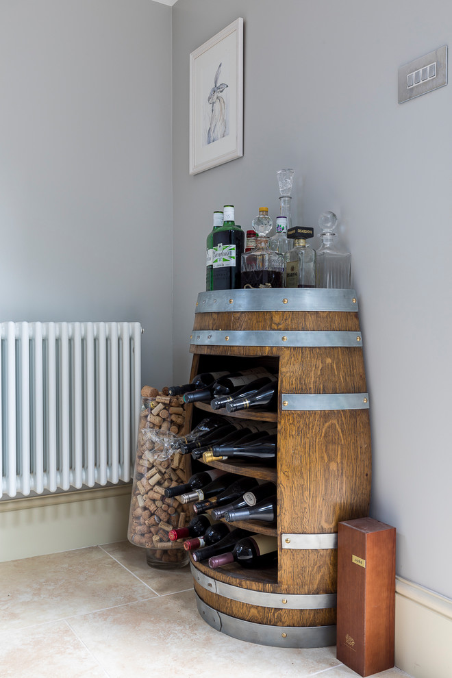 Photo of a medium sized rural home bar in London with limestone flooring and beige floors.