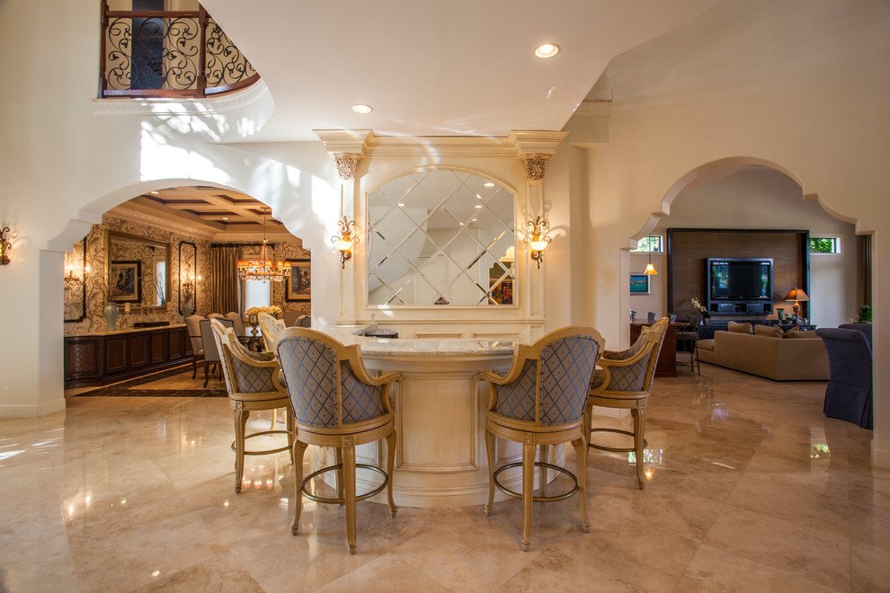 Mid-sized trendy u-shaped marble floor seated home bar photo in Miami with marble countertops