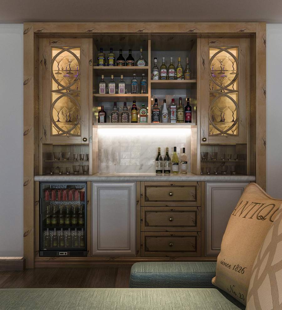 Home bar - small transitional single-wall home bar idea in Los Angeles with distressed cabinets, marble countertops and glass sheet backsplash