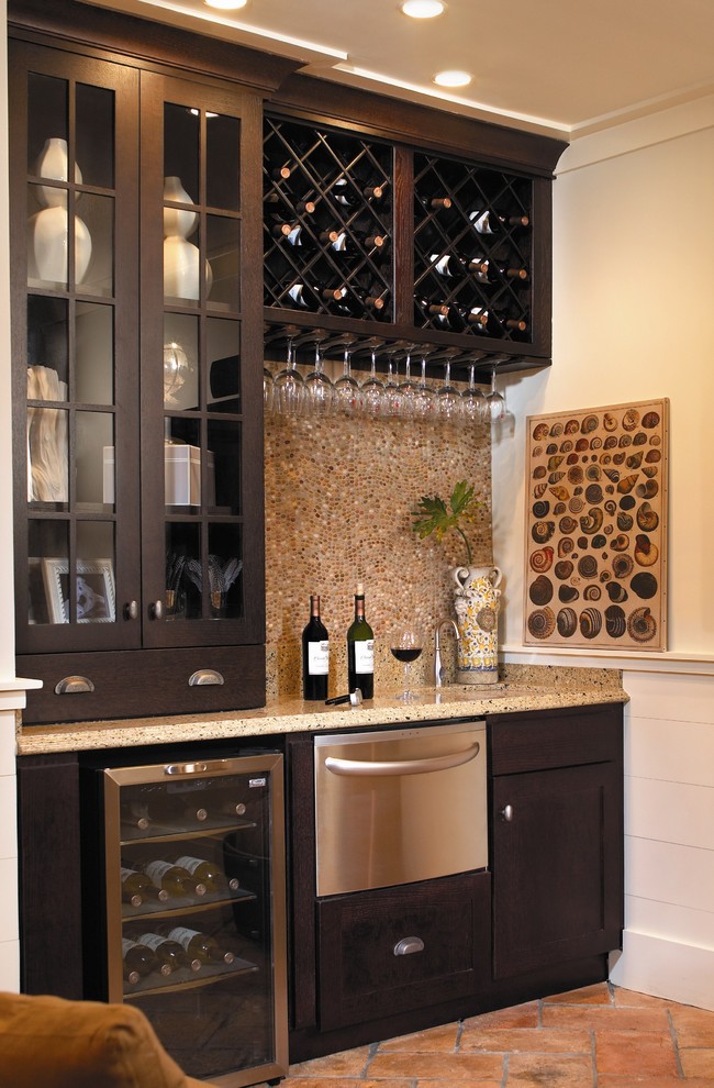 Example of a mid-sized classic single-wall wet bar design in Atlanta with glass-front cabinets, dark wood cabinets, beige backsplash and mosaic tile backsplash