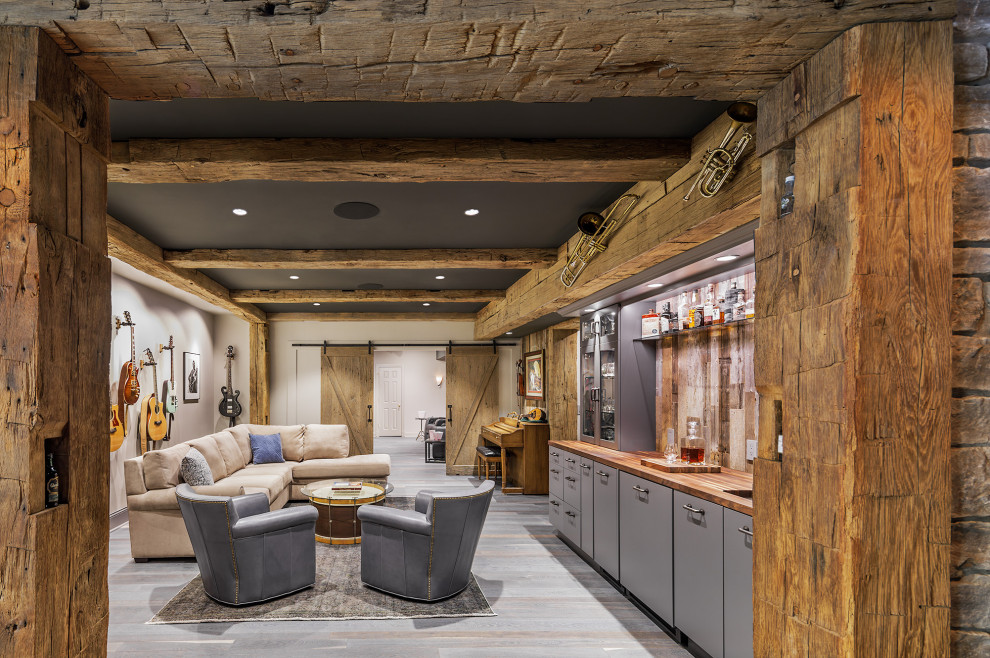 Inspiration for a mid-sized rustic single-wall dark wood floor and gray floor wet bar remodel in DC Metro with an undermount sink, flat-panel cabinets, gray cabinets, wood countertops, gray backsplash, wood backsplash and brown countertops
