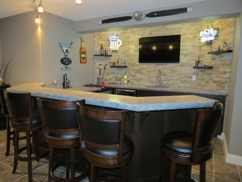 Example of a home bar design in Other with an undermount sink, concrete countertops, beige backsplash and stone tile backsplash
