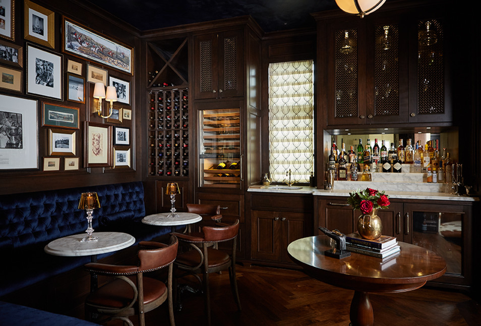 Expansive traditional home bar in Grand Rapids.