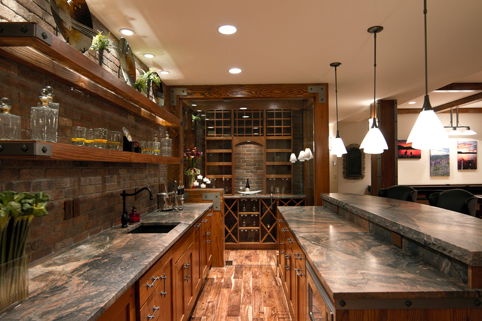 Design ideas for a large traditional galley breakfast bar in Salt Lake City with medium hardwood flooring, a submerged sink, shaker cabinets and medium wood cabinets.