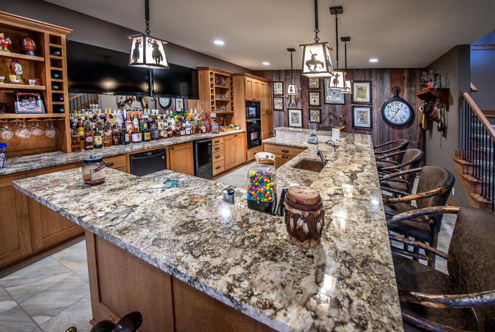 This is an example of a large rustic breakfast bar in Omaha with a submerged sink, shaker cabinets and medium wood cabinets.
