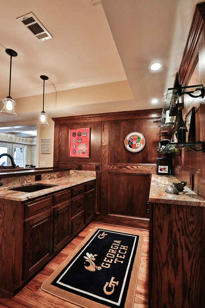 Example of a large classic home bar design in Atlanta