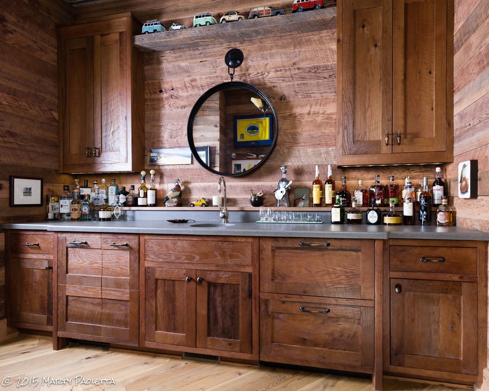 Inspiration for a large traditional home bar in Nashville.