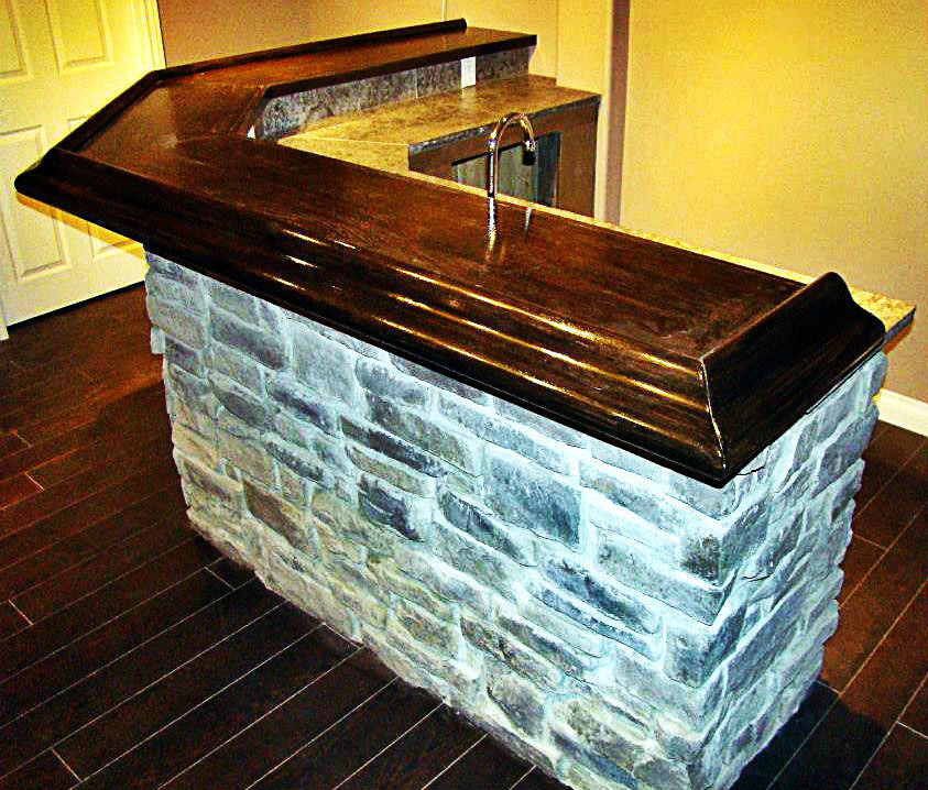 Design ideas for a medium sized rustic u-shaped wet bar in Toronto with a submerged sink, tile countertops and dark hardwood flooring.