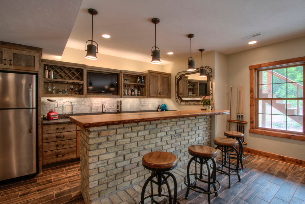 Dousman, WI Rustic Home Bar Milwaukee by C. er Builders, Inc