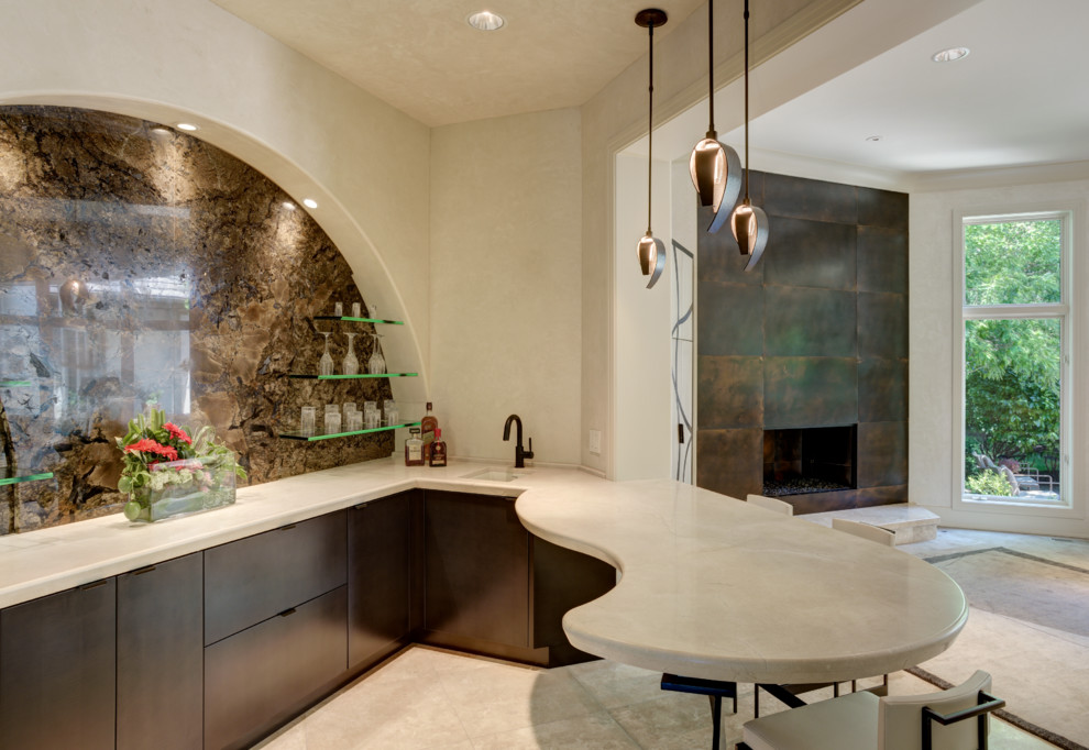 Wet bar - mid-sized eclectic l-shaped travertine floor wet bar idea in Kansas City with an undermount sink, flat-panel cabinets, dark wood cabinets, solid surface countertops, brown backsplash and ceramic backsplash