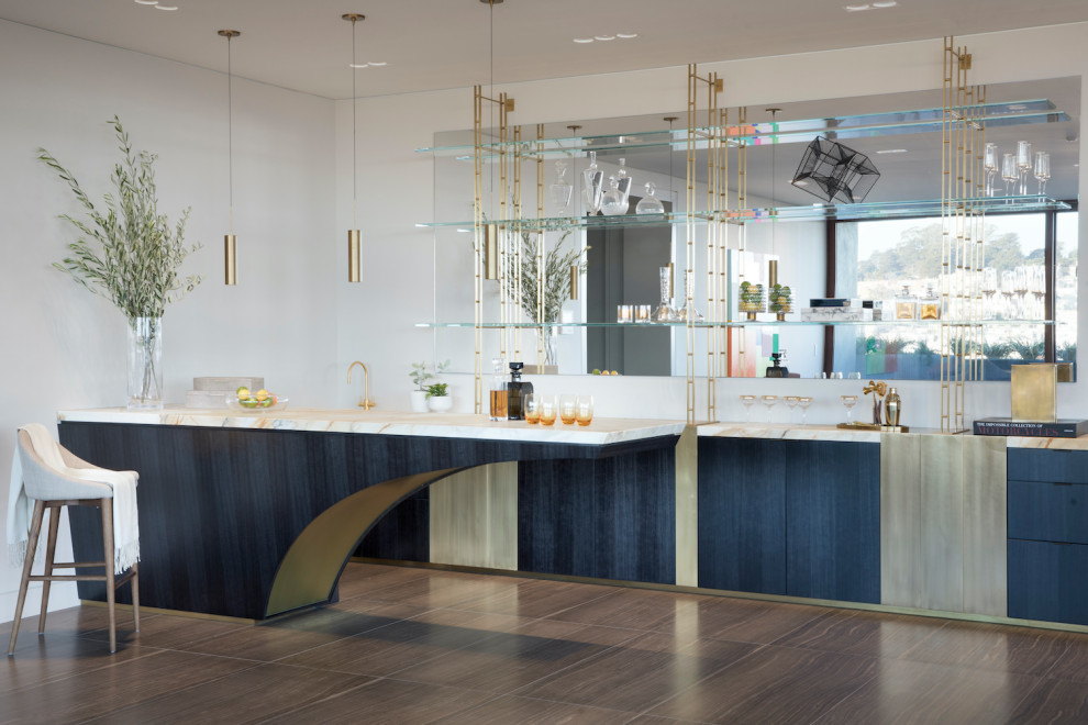 Design ideas for a large contemporary galley breakfast bar in San Francisco with flat-panel cabinets, blue cabinets, brown floors and beige worktops.