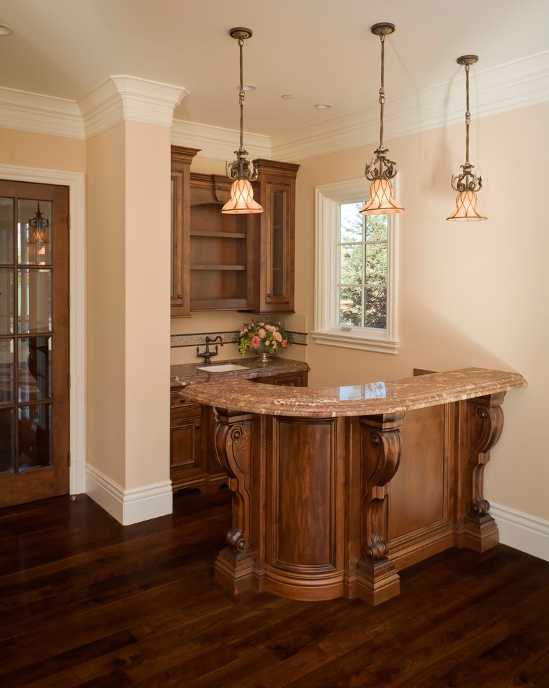 Inspiration for a mid-sized timeless dark wood floor home bar remodel in San Francisco with an undermount sink, recessed-panel cabinets and medium tone wood cabinets