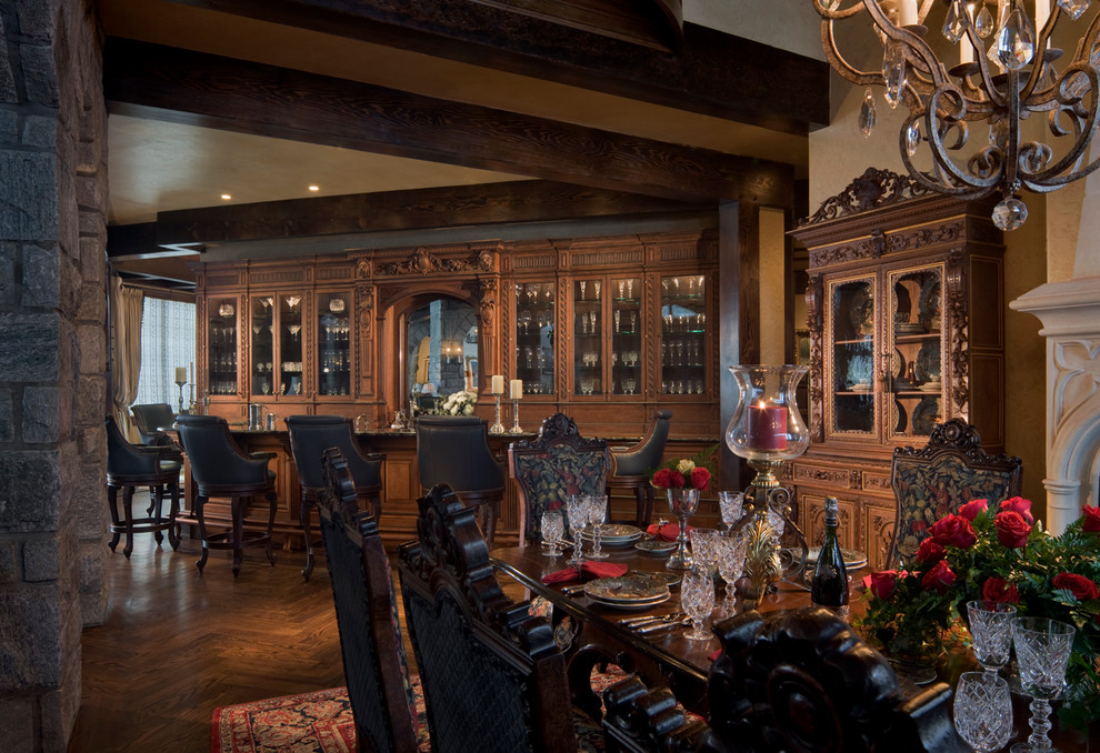 Large ornate single-wall wet bar photo in Charlotte with raised-panel cabinets, medium tone wood cabinets and granite countertops