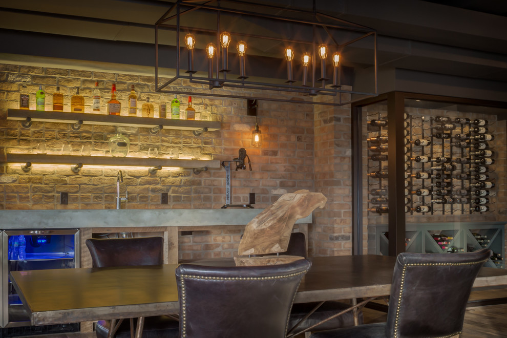 Esempio di un grande angolo bar con lavandino country con top in cemento, paraspruzzi in mattoni e pavimento in vinile