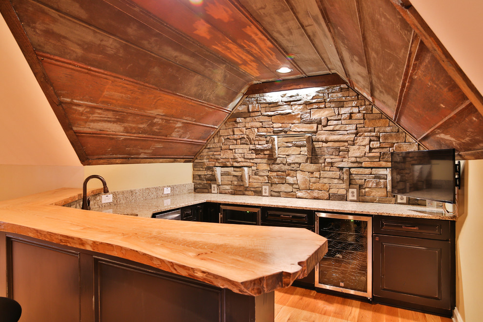 Inspiration for a rustic home bar remodel in Raleigh