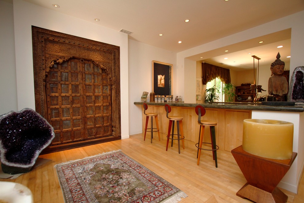 Photo of a medium sized world-inspired galley wet bar in Los Angeles with bamboo flooring.