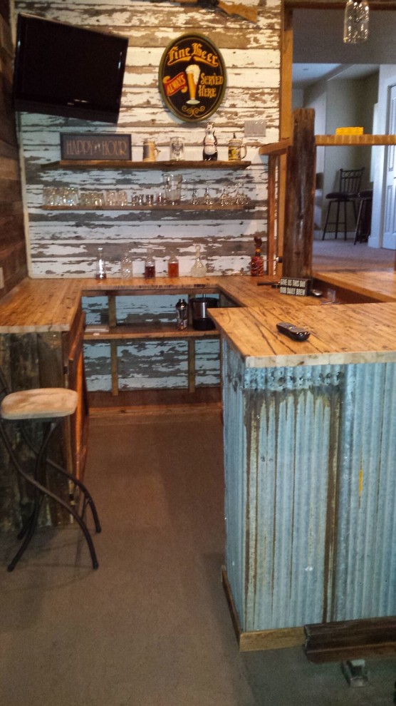 Large rustic l-shaped breakfast bar in Denver with a submerged sink, recessed-panel cabinets, dark wood cabinets, wood worktops, brown splashback, wood splashback, laminate floors and brown floors.