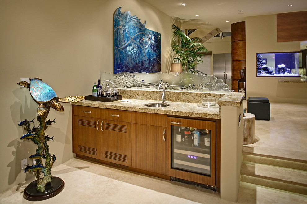 Example of a large island style home bar design in Orange County