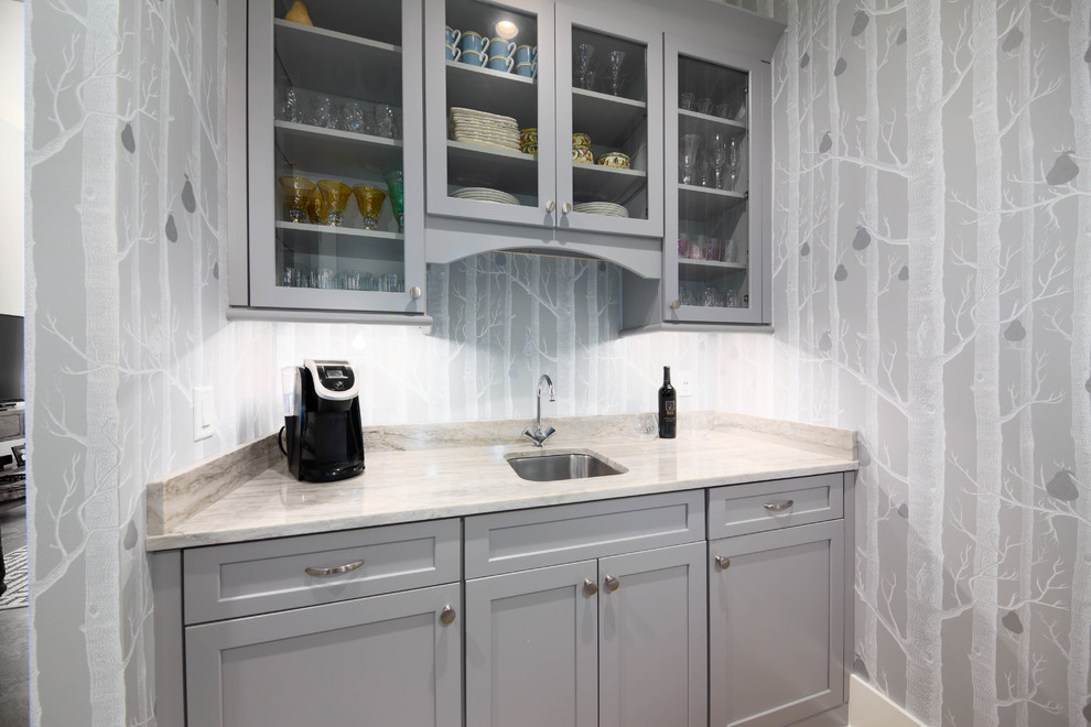 Inspiration for a medium sized classic single-wall wet bar in Other with a submerged sink, shaker cabinets, grey cabinets, quartz worktops, grey splashback, medium hardwood flooring, brown floors and grey worktops.