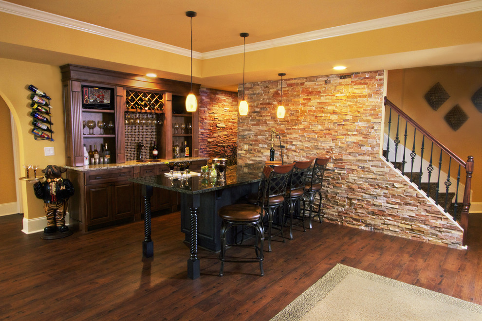 Photo of a medium sized contemporary galley breakfast bar in Atlanta with dark wood cabinets, granite worktops, multi-coloured splashback and medium hardwood flooring.