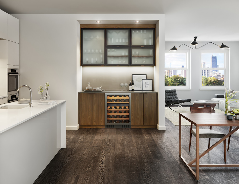 Design ideas for a large contemporary single-wall wet bar in Miami with dark hardwood flooring, a submerged sink, flat-panel cabinets, composite countertops, brown floors and dark wood cabinets.