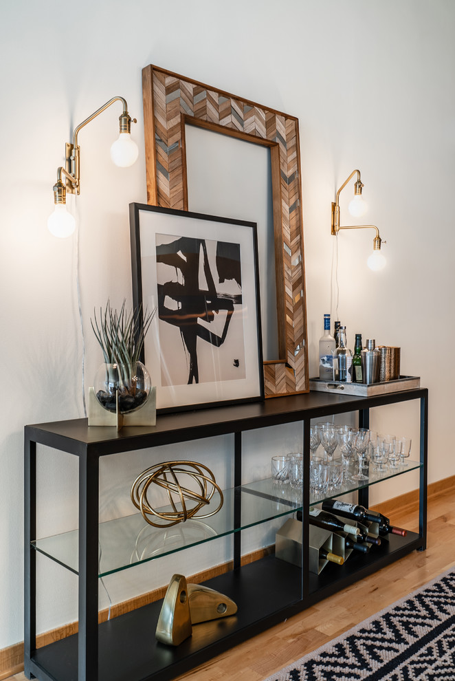 Design ideas for a medium sized industrial single-wall bar cart in Phoenix with light hardwood flooring and brown floors.