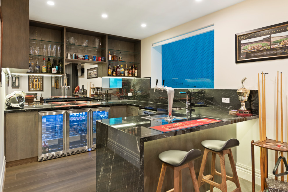 Photo of a large contemporary u-shaped wet bar in Melbourne with a submerged sink, open cabinets, dark wood cabinets, marble worktops, multi-coloured splashback, mirror splashback, medium hardwood flooring, brown floors and grey worktops.