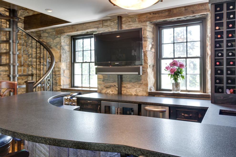 Inspiration for a large rustic l-shaped breakfast bar in DC Metro with a built-in sink, beaded cabinets, distressed cabinets, granite worktops and medium hardwood flooring.