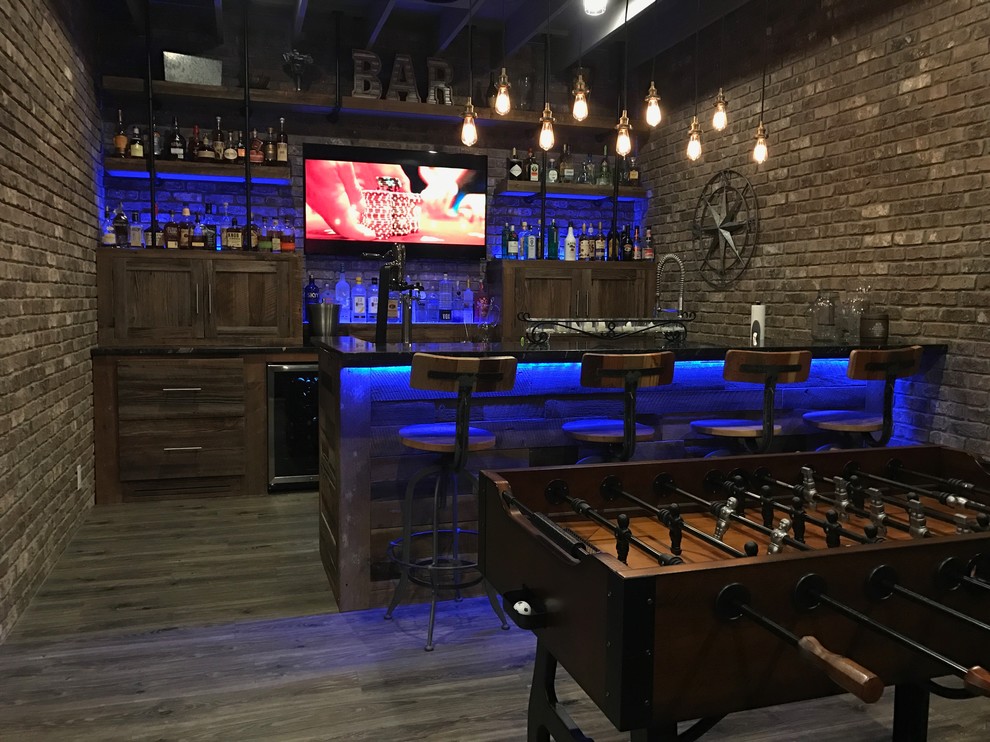 Home bar - industrial home bar idea in Atlanta
