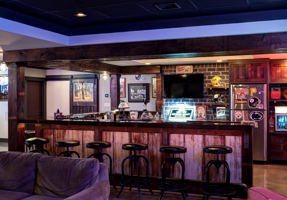 Example of an urban home bar design in Other