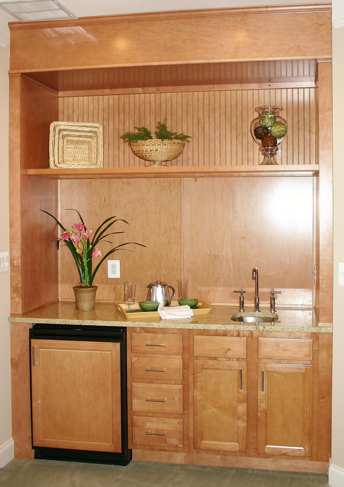 Mid-sized elegant single-wall carpeted and beige floor wet bar photo in Baltimore with an undermount sink, recessed-panel cabinets, light wood cabinets and granite countertops