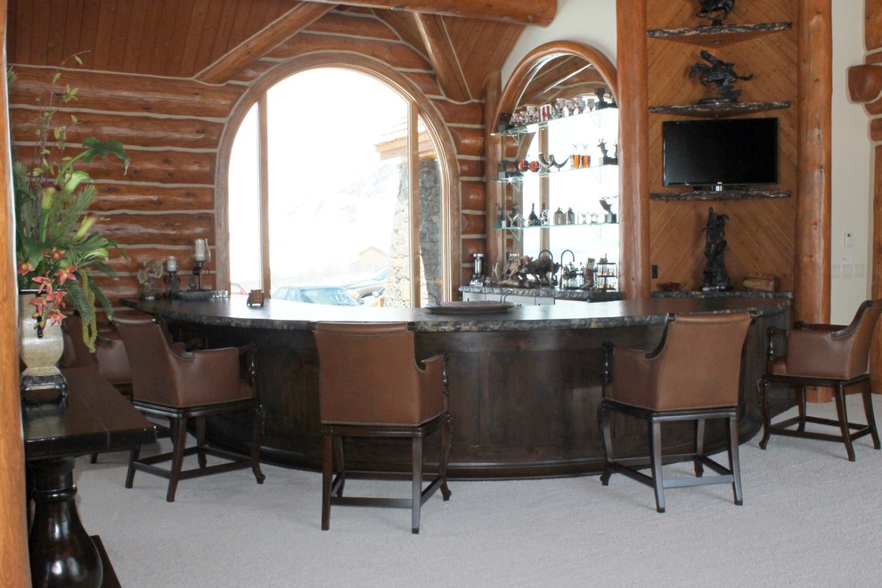 This is an example of a rustic home bar in Other.