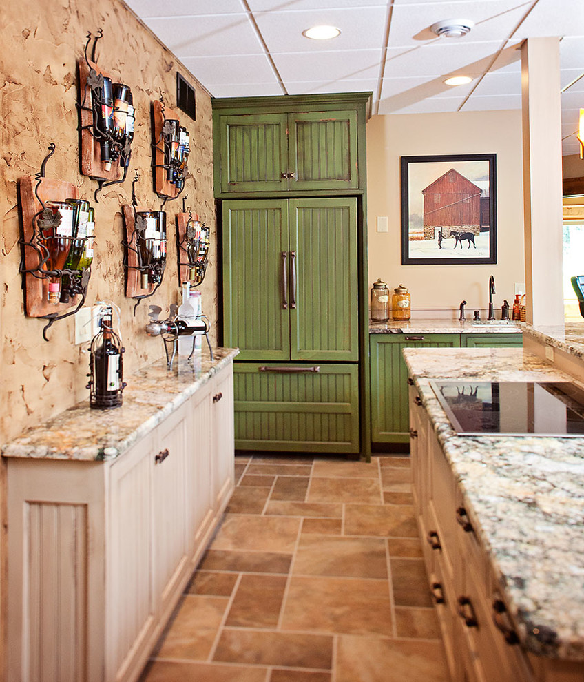 Rustic home bar in Other with recessed-panel cabinets and green cabinets.